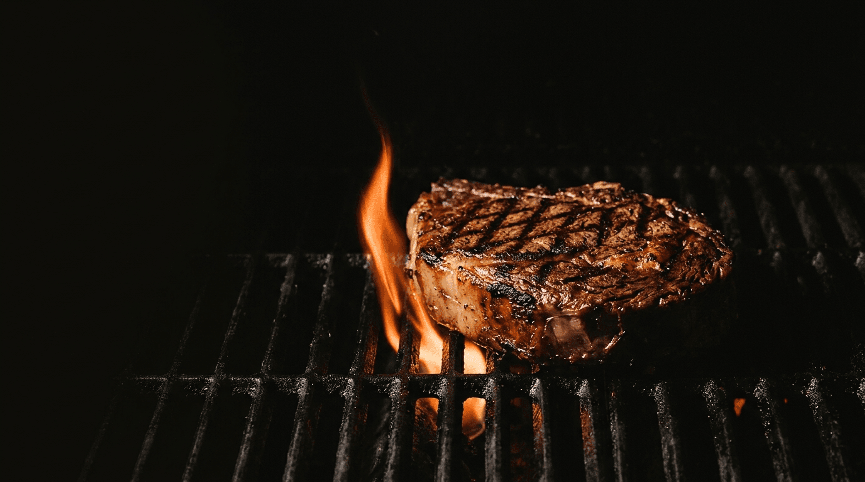 steak over open flame